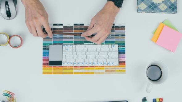 Unrecognizable Creative Designer Working With Colors On His Workplace