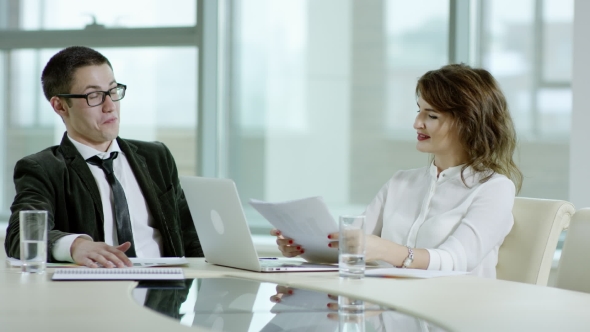 Cheerful Businessman and Woman