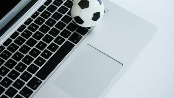 Close-up of football on laptop 4k