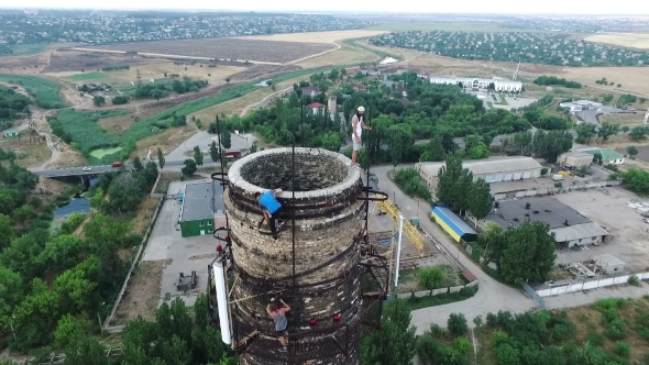 Extreme Sports. Young Guys Perform Stunts On Top.