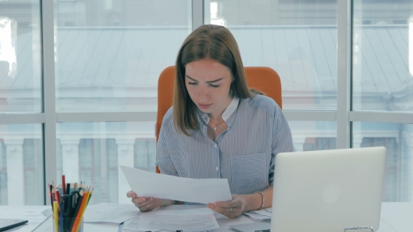Young Attractive Business Woman Working With Computer, Papers In Office.