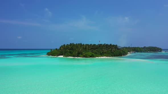 Aerial drone view seascape of exotic coast beach break by blue ocean and clean sandy background of a