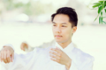 Handsome man practicing thai chi - PhotoDune Item for Sale
