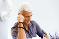 Handsome businessman in office - PhotoDune Item for Sale