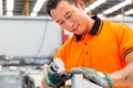 Asian worker in production plant on the factory floor - PhotoDune Item for Sale