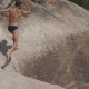 Man Leaping On The Rocks Near Lakeshore And Jumping Off Cliff Into The Water. Summer Fun Lifestyle - VideoHive Item for Sale