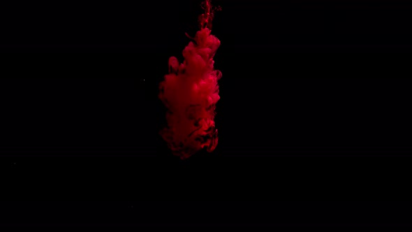 Red Ink In A Black Background