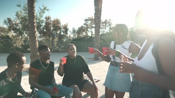 Group of Young Modern African Black Friends Happily Sitting Together