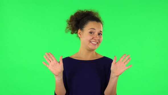 Portrait of Upset Woman Negatively Waving Her Head Expressing She Is Innocent. Green Screen