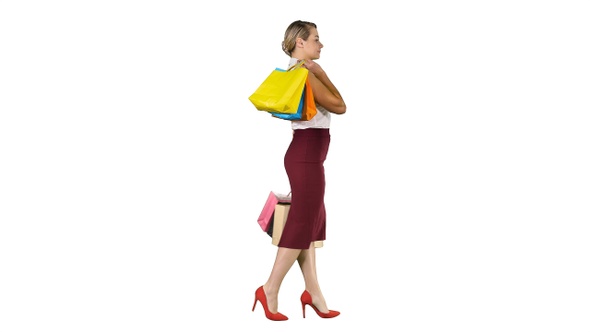 Happy Shopping! Woman Holding Multicolored Shopping Bags