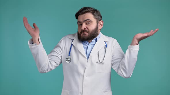 Indifferent Unsure Doctor Man Makes Gesture of I Dont Know Cant Help Anything