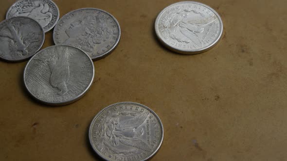 Rotating stock footage shot of antique American coins 