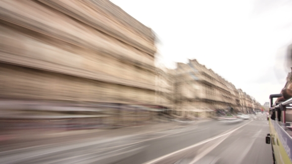 View From Moving Touristic Bus On Road And Buildings Is Paris, France