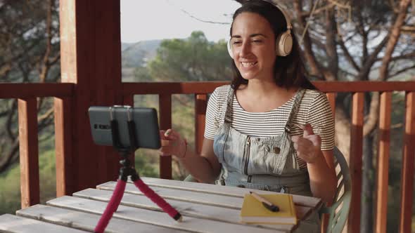 Woman Recording Video Vlog Using Mobile Phone