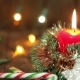 One Burning Candle And Christmas Decorations - VideoHive Item for Sale