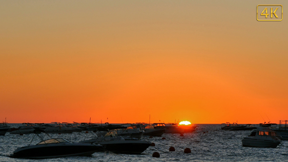 Golden Sunrise over the Mediterranean Sea with Boats 4K