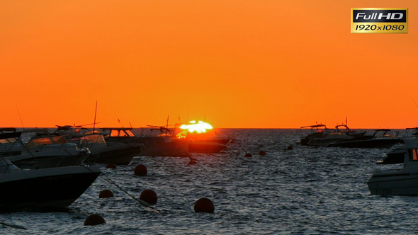 Golden Sunrise over the Mediterranean Sea with Boats