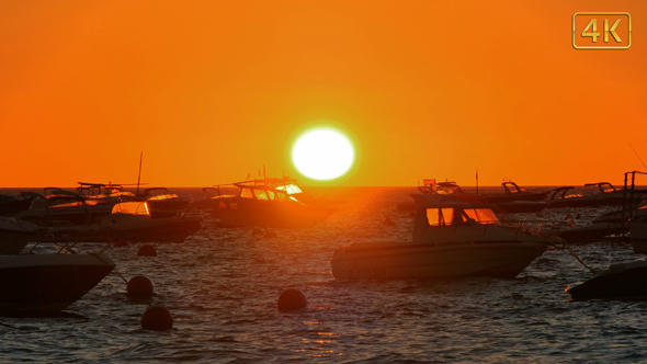 Golden Sunrise over the Mediterranean Sea with Boats 4K