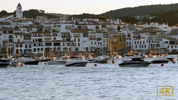 Anchored Boats in Front of a Mediterranean Village 4K