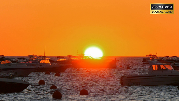 Golden Sunrise over the Mediterranean Sea with Boats