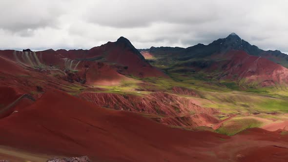 Pan shot of Red Valley, a new tourist attraction in Cusco, Perú. Marvelous color mountains in the An