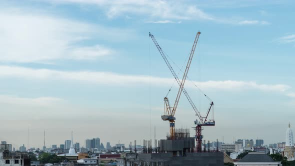 Footage B roll of Timelapse Cranes Working on Construction Site