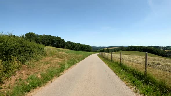 POV Driving on motorcycle on a scenic road in Eifel National Park in Germany