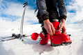 getting ready for skiing - fastening the boots - PhotoDune Item for Sale
