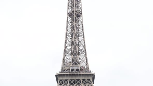 The Eiffel Tower iron lattice tower famous French architecture achievemnet slow tilt 4K 2160p 30fps 