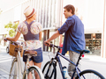 Happy couple in city with bike - PhotoDune Item for Sale