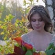 A Young Woman Dressed in a Gray Wedding Dress Celebrates Her Wedding, She Has Flowers in Her Hand - VideoHive Item for Sale