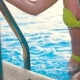 Beautiful Young Woman Comes Up The Stairs Out Of The Pool.  - VideoHive Item for Sale