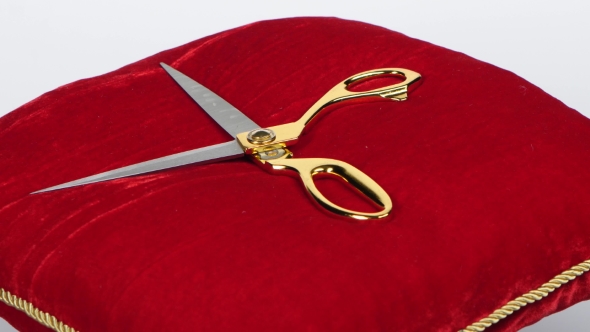 Disclosed Scissors On Red Pillow. Rotation. White