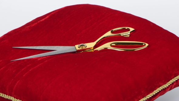 Golden Shears. Red Cushion For Opening Ceremonies. Rotation. White