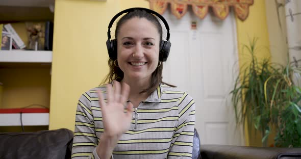 Woman working from home having a remote meeting on a video call