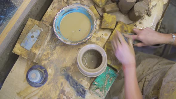 Woman Hands Working on the Potter's Wheel