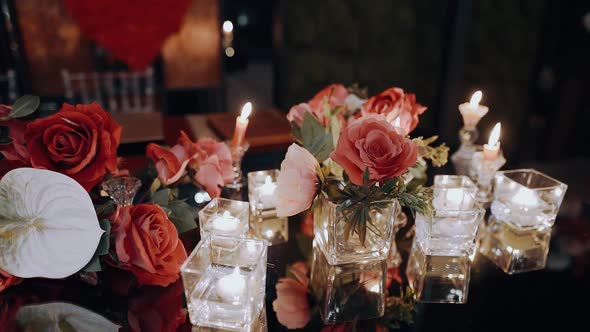 Close Frame of the Perfect Decor a Table Decorated with Pink Red Roses and Candles