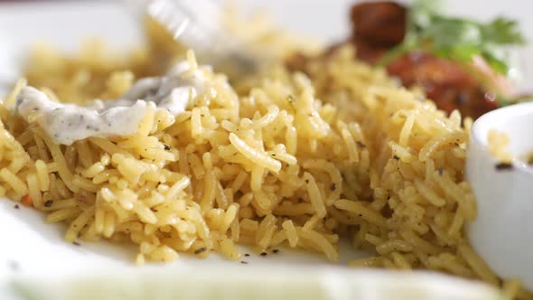 Cooked Rice in a Bowl on Table Close Up