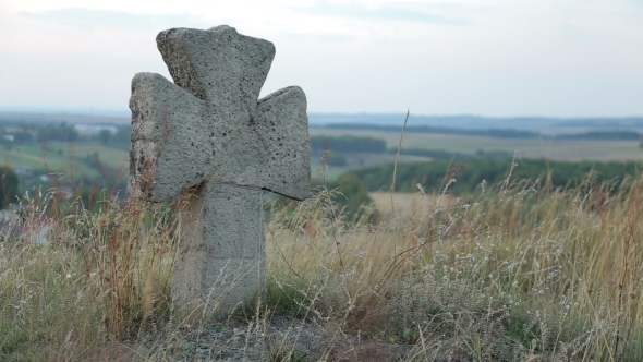 Old Stone Cross In Cemetery