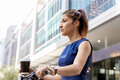 Young woman commuting on bicycle - PhotoDune Item for Sale