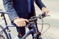 Successful businessman riding bicycle - PhotoDune Item for Sale