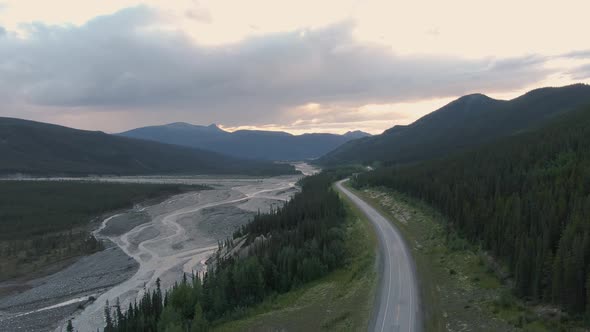 Beautiful View of Scenic Road By Glacial River at Sunset