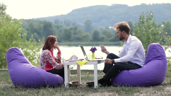 Two Business People Having a Informal Meeting