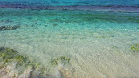 Wide angle fly over abstract view of a white sandy paradise beach and blue water background in best 