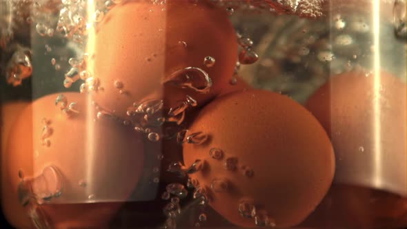 Super Slow Motion Eggs are Boiled Underwater with Air Bubbles