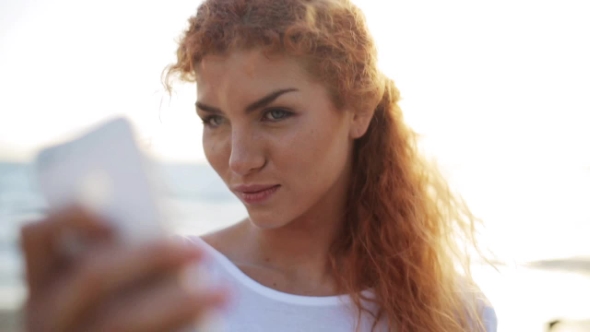 Happy Woman Taking Selfie With Smartphone On Beach 39