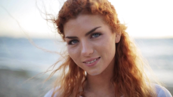 Happy Young Redhead Woman Face On Beach 49