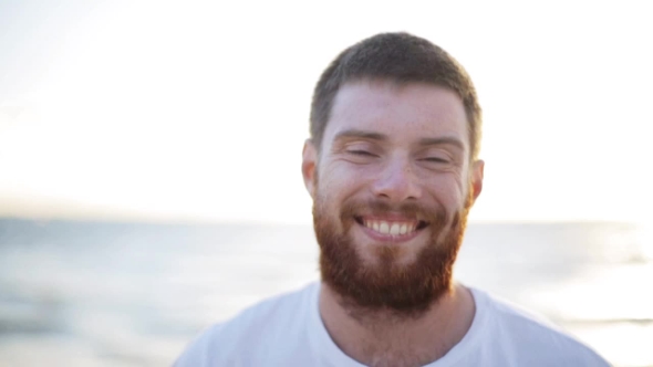 Face Of Happy Smiling Young Man On Beach 54