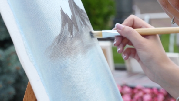 Artist Working on a Nature Landscape