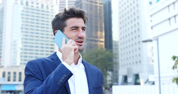 Businessman talk to cellphone at outdoor